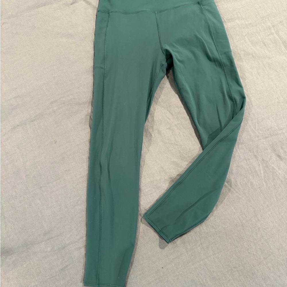 VUORI STUDIO POCKET LEGGING
Size: S